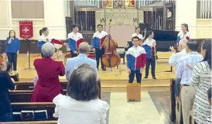  ??  ?? Malvin Beethoven Macasaet and Jade Riccio perform with the OFY at the Young People’s Concerence (concert-conference) in 2015 (top). The members of the OFY get a standing ovation during their educationa­l tour in the US (above). Ang Misyon makes it to...