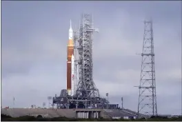  ?? JOHN RAOUX — THE ASSOCIATED PRESS ?? The NASA Artemis rocket with the Orion spacecraft aboard stands on pad 39B at the Kennedy Space Center in Cape Canaveral, Fla., on March 18.