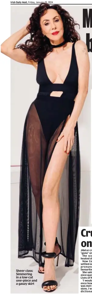  ?? ?? Sheer class: Simmering in a low-cut one-piece and a gauzy skirt
