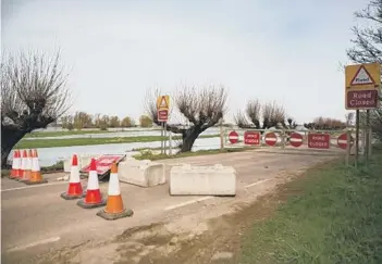  ??  ?? The B1040 was closed due to floods. Pic: Terry Harris