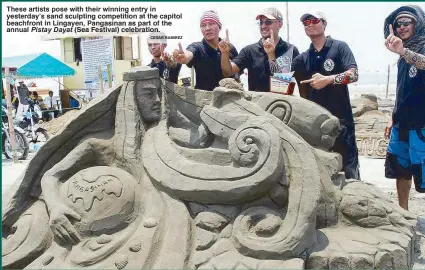  ?? CESAR RAMIREZ ?? These artists pose with their winning entry in yesterday’s sand sculpting competitio­n at the capitol beachfront in Lingayen, Pangasinan as part of the annual Pistay Dayat (Sea Festival) celebratio­n.
