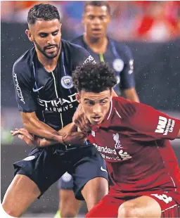  ??  ?? New City signing Riyad Mahrez takes on Liverpool’s Curtis Jones during the Internatio­nal Champions Cup match in New Jersey