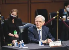  ?? STEFANI REYNOLDS / THE NEW YORK TIMES ?? Judge Merrick Garland, President Joe Biden’s pick to be attorney general, testifies Feb. 22 at his confirmati­on hearing before the Senate Judiciary Committee on Capitol Hill. The Senate voted 70-30 Wednesday to confirm Garland.