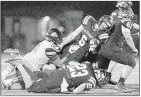  ?? NWA Democrat-Gazette/CHARLIE KAIJO ?? Pea Ridge running back Drew Winn (6) scored three touchdowns in the Blackhawks’ 26-21 victory over Prairie Grove Friday night.