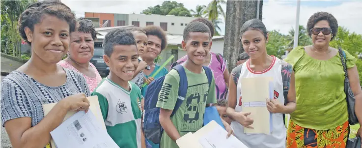  ?? Photo: Ronald Kumar ?? Suva Sangam High School students with their parents after collecting their school supplement­ary activities material on May 4, 2020.