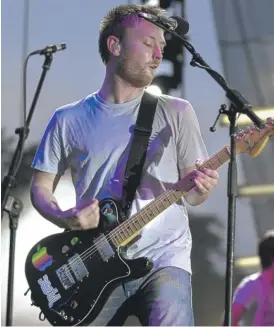  ?? SUN-TIMES FILE ?? Radiohead lead singer Thom Yorke performing with the band Aug. 1, 2001, at Hutchinson Field