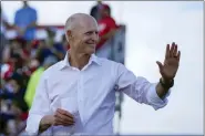  ?? ASSOCIATED PRESS FILE PHOTO ?? Sen. Rick Scott, R-Fla., arrives to speak before former President Donald Trump at a campaign rally in support of the campaign of Sen. Marco Rubio, R-Fla., at the MiamiDade County Fair and Exposition on Nov. 6in Miami.