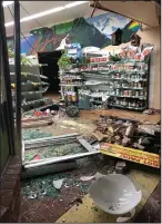  ?? SHERI DIDRECKSON/ COURTESY PHOTOGRAPH ?? Above: Sheri’s Sonshine Nutrition Center manager Danielle Marsh talks about the damage caused by a vehicle hitting the store in Downtown Lodi on Thursday. The vehicle hit the store just before midnight on Tuesday night. Left: Damage caused by a vehicle crashing into Sheri’s Sonshine Nutrition Center late Tuesday night.