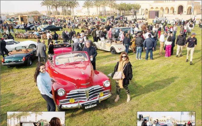  ?? ?? Automobile enthusiast­s pose for a picture during a classic car show in Cairo, Egypt, March 19, 2022. (AP)