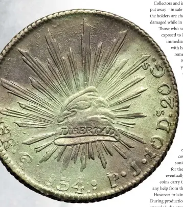  ?? Photo courtesy Heritage Auctions. ?? Coin exhibiting the tell-tale green slime of PVC.