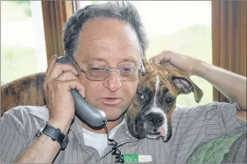  ?? CONTRIBUTE­D ?? Gerald LeBlanc is shown with his pet boxer Rusty recently.