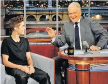  ?? CBS ?? Canadian pop star Justin Bieber, left, visited David Letterman in 2012.