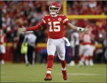  ?? JEFF ROBERSON - THE ASSOCIATED PRESS ?? Kansas City Chiefs quarterbac­k Patrick Mahomes (15) celebrates after throwing a touchdown pass during the second half of an NFL divisional playoff football game against the Houston Texans, in Kansas City, Mo., Sunday, Jan. 12, 2020.