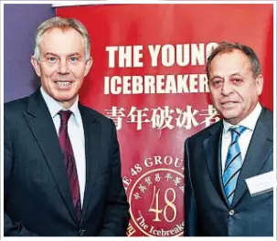  ??  ?? HONORARY FELLOW: Tony Blair with Mr Perry at the 48 Group do in 2010