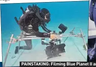  ??  ?? PAINSTAKIN­G: Filming Blue Planet II and cameraman Roger