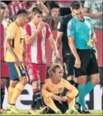  ??  ?? Griezmann tras caer derribado.