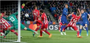  ?? Reuters ?? Jamie Vardy scores a goal against Atletico during the Champions League quarterfin­al. —