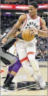  ?? AP PHOTO ?? Toronto Raptors guard DeMar DeRozan, right, is fouled by Sacramento Kings guard Garrett Temple during the first half of an NBA game Sunday in Sacramento, Calif.