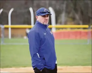  ?? Pete Paguaga/Hearst Connecticu­t Media / ?? Coginchaug coach Mark Basil looks on during a game against Fairfield Warde on Saturday.