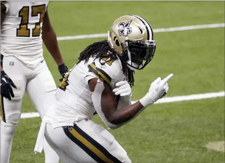  ?? BUTCH DILL — THE ASSOCIATED PRESS ?? New Orleans Saints running back Alvin Kamara (41) reacts after his fifth touchdown of the game. Kamara tied an NFL record with six rushing touchdowns in Sunday’s win over the Vikings.