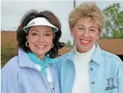  ??  ?? Then Oklahoma first lady Cathy Keating and Ann Felton Gilliland, chairman and CEO of Central Oklahoma Habitat for Humanity, at the first Habitat Women’s Build in the 1990s.