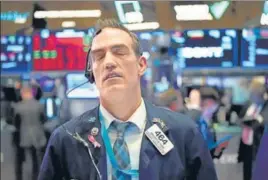  ?? AFP ?? Trading was halted for 15 minutes shortly after the open in New York after the S&P 500 index fell more than 7%.
