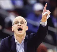  ?? Adam Hunger / Associated Press ?? UConn coach Dan Hurley directs his team against Seton Hall on Saturday in Newark, N.J.