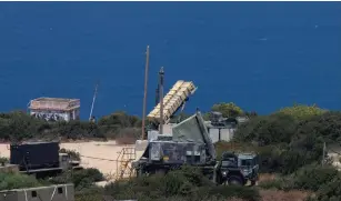  ?? (Baz Ratner/Reuters) ?? A PATRIOT ANTI-MISSILE battery is deployed in Haifa in August 2013.
