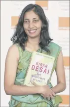  ?? Shaun Curry / Getty Images ?? Author Kiran Desai poses with her book “The Inheritanc­e of Loss,” a favorite summer read this year for Donna Liquori.