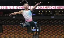  ?? Elise Amendola / Associated Press ?? Simone Biles practices on the floor Wednesday in preparatio­n for the women’s national competitio­n that begins Friday.