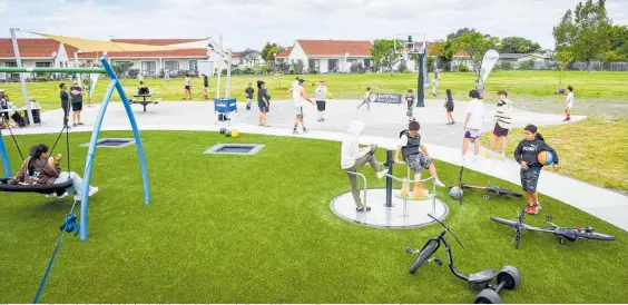  ?? Photos / Ian Cooper ?? The newest Hoops in Parks initiative built basketball court in Essex St Reserve, Tamatea, opened on Sunday.