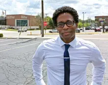  ?? AP Photo/Jim Salter ?? ■ Wesley Bell stands Wednesday outside the Ferguson, Mo., police headquarte­rs, a day after he defeated longtime St. Louis County prosecutor Bob McCulloch in the Democratic primary. Some observers saw the race as a referendum on McCulloch’s handling of the fatal police shooting of Michael Brown in 2014. No Republican­s are on the November ballot.