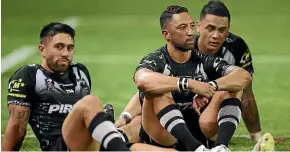 ?? GETTY IMAGES ?? Kiwis halves Shaun Johnson, left, and Benji Marshall are dejected after losing badly to Australia in Wollongong on Friday night.