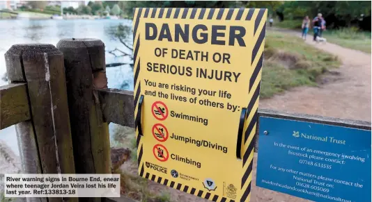  ?? ?? River warning signs in Bourne End, enear where teenager Jordan Veira lost his life last year. Ref:133813-18