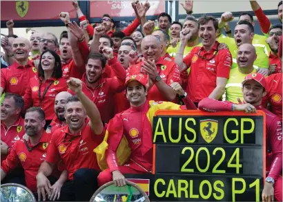  ?? ?? Carlos Sainz and the Ferrari team celebrate winning the Australian Grand Prix