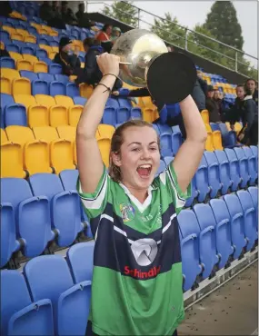  ??  ?? Bray captain Roisin Quigley raises the cup after the Junior camogie final.