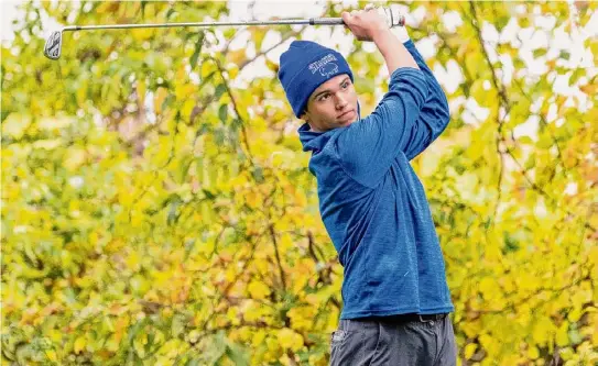  ?? Jim Franco/times Union ?? Shaker’s Kieran Cummins hits a tee shot in the final round of the Section II state qualifier Wednesday. He had five birdies.