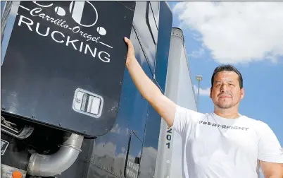  ?? The Dallas Morning News/NATHAN HUNSINGER ?? Dallas-area independen­t trucker Sam Carrillo said he uses two apps, one of which is Uber Freight, and now earns $200 to $400 more per trip.