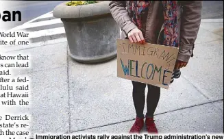  ?? REUTERS ?? Immigratio­n activists rally against the Trump administra­tion’s new ban against travelers from six Muslim-majority nations near the US Customs and Border Protection headquarte­rs in Washington on Wednesday.
