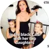  ??  ?? In the black: Carli with her two daughters