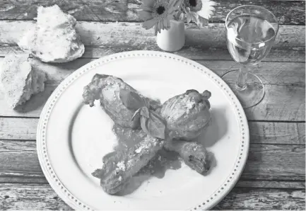  ?? SARA MOULTON VIA AP ?? This dish of stuffed fried zucchini blossoms is from a recipe by Sara Moulton.