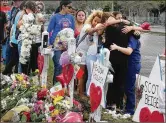  ?? MELANIE BELL / THE PALM BEACH POST ?? West Boca High School students walked to Marjory Stoneman Douglas High School in Parkland on Tuesday.