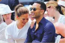  ?? Reuters ?? Musician John Legend and his wife, model Chrissy Teigen, attend the Tennis Hall of Fame induction ceremonies.