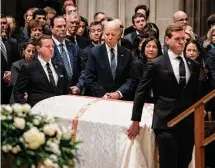  ?? Haiyun Jiang/New York Times ?? President Joe Biden stands as the coffin of former Justice Sandra Day O’Connor, the first woman on the Supreme Court, arrives at her funeral Tuesday at Washington National Cathedral.