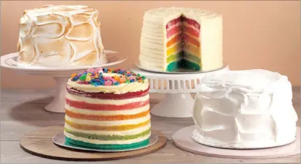  ??  ?? An assortment of signature rainbow cakes with different toppings.