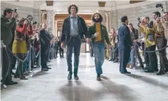  ?? (Netflix) ?? SACHA BARON COHEN (left) portrays Abbie Hoffman.