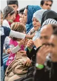  ?? Foto: Boris Roessler, dpa ?? Asylbewerb­er in einem Ankunftsze­ntrum in Gießen.