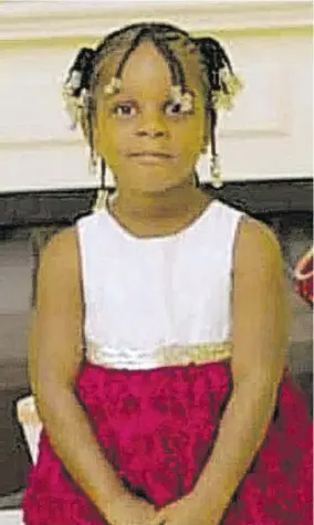  ?? ?? Little Denique Salmon who was killed in her sleep by a stray bullet as gangsters exchanged gunfire in Duhaney Park early Wednesday morning.