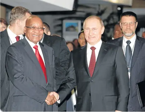  ?? /Thuli Dlamini ?? Power shake: President Jacob Zuma and Russian President Vladimir Putin have worked their way up the political hierarchy with considerab­le precision. With experience as intelligen­ce officers, they are skilled in creating patronage networks and...