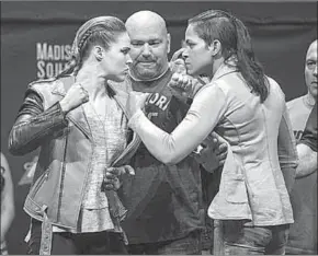  ??  ?? Ronda Rousey (left) versus Amanda Nunes (Photos: nypost)